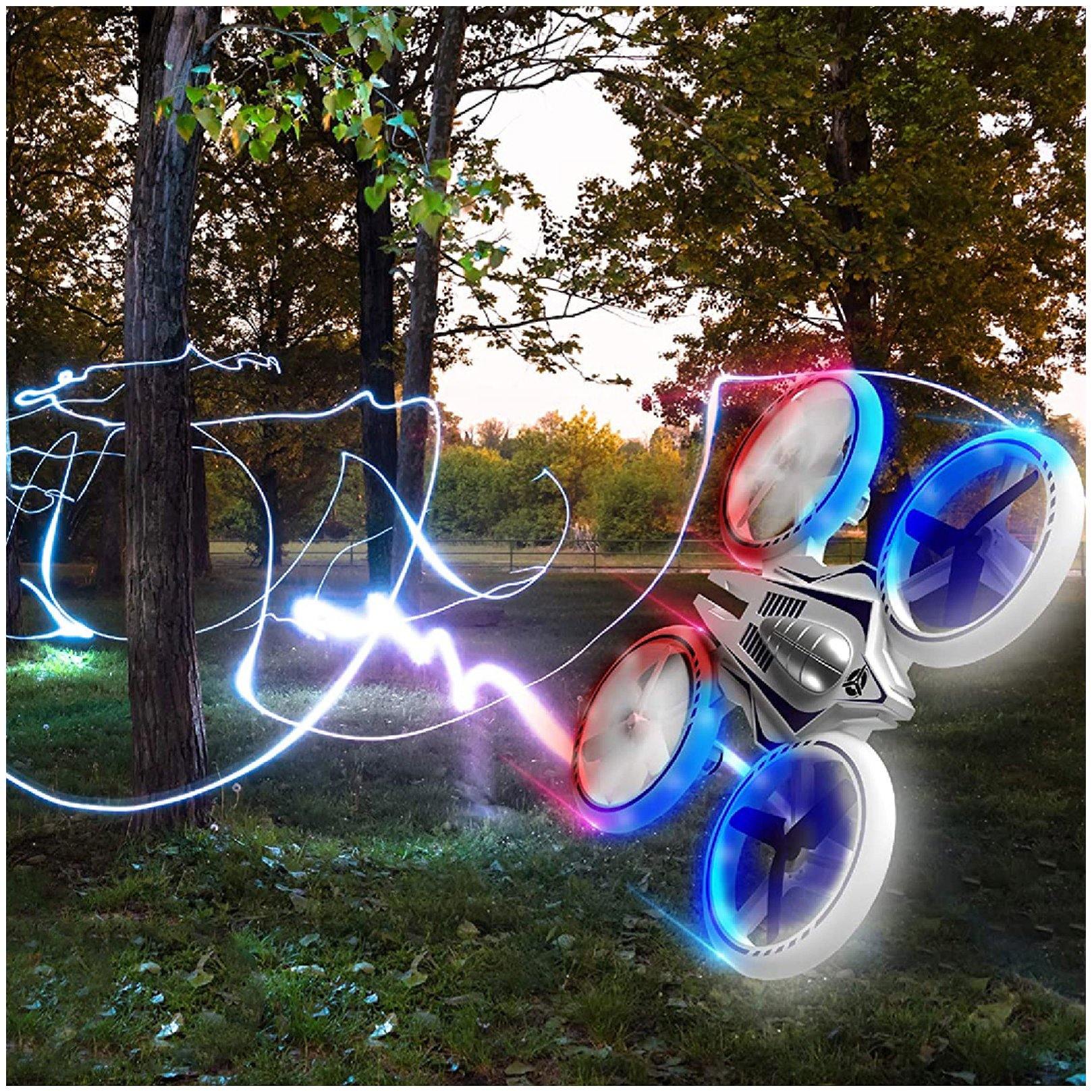 White drone, white remote control, and blue propellers-