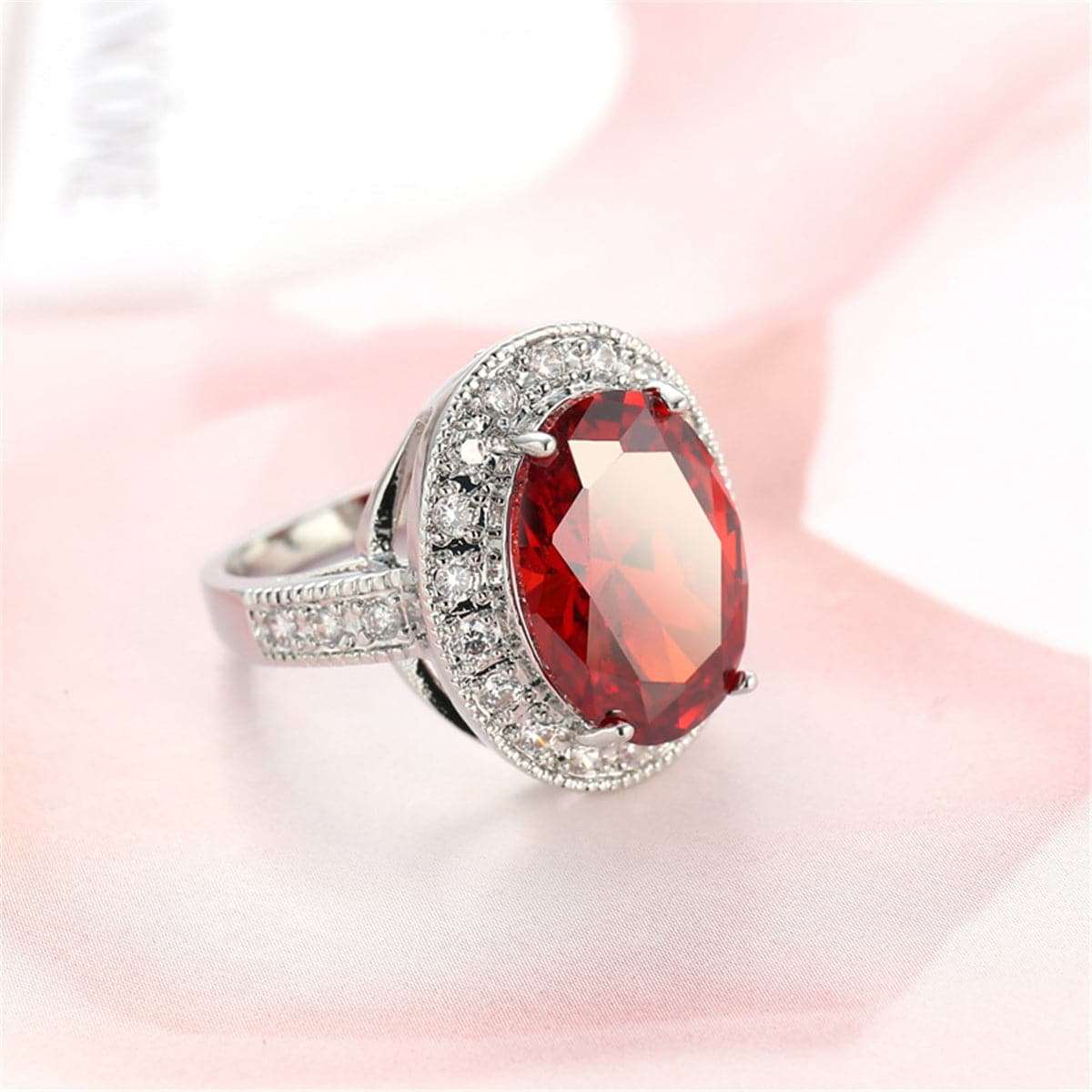 Red Crystal & Silvertone Oval Halo Ring
