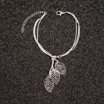 Silvertone Leaves Strand Charm Bracelet