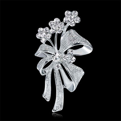 Cubic Zirconia & Silvertone Bow Botany Brooch