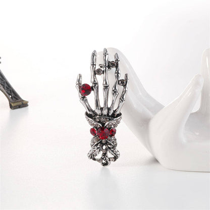 Cubic Zirconia & Silvertone Skeleton Hand Brooch