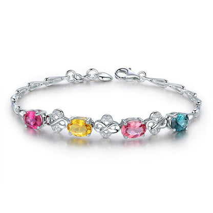 Blue Crystal & Silvertone Clover Charm Bracelet