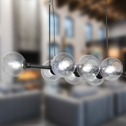 River of Goods 48" L 8-Light Mariko Black Metal and Smoked Glass Chandelier