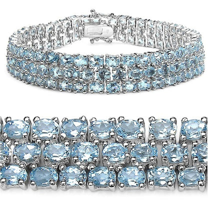 26.20 Ct Oval Sky Blue Topaz Prong Sterling Silver Triple Row Tennis Bracelet