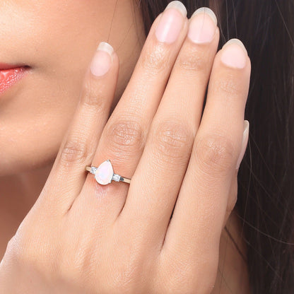 0.90 Ct Pear White Ethiopian Opal and Lab Diamond Prong Silver Three Stone Ring