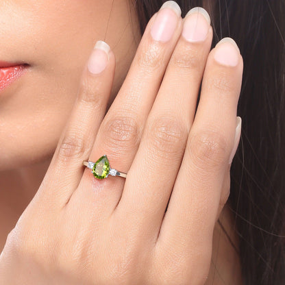 1.10 Ct Pear Green Peridot and Lab Diamond Prong Silver Three Stone Ring