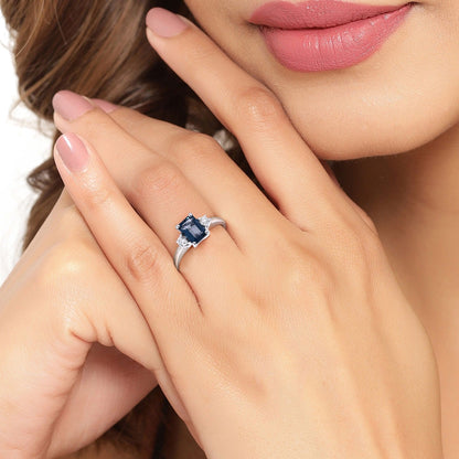 1.07 Ct Octagon London Blue Topaz and Diamond Prong Silver Three Stone Ring