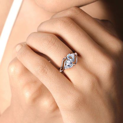 0.80 Ct Oval Blue Aquamarine and Lab Diamond Silver Bypass Promise Ring