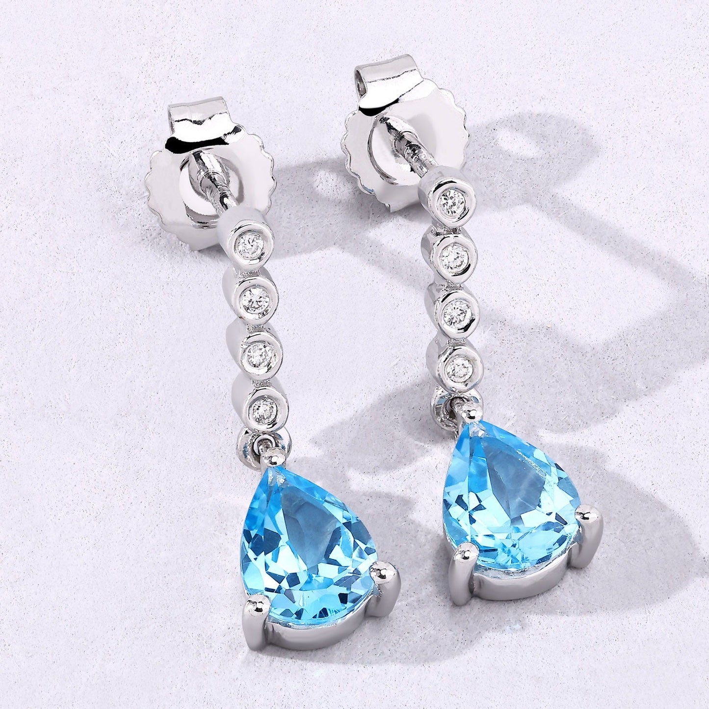 2.30 Ct Pear Swiss Blue Topaz & Lab Diamond Prong Silver Teardrop Dangle Earrings