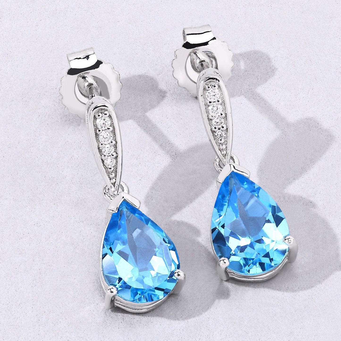 3.80 Ct Pear Swiss Blue Topaz & Lab Diamond V-Prong Silver Teardrop Dangle Earrings