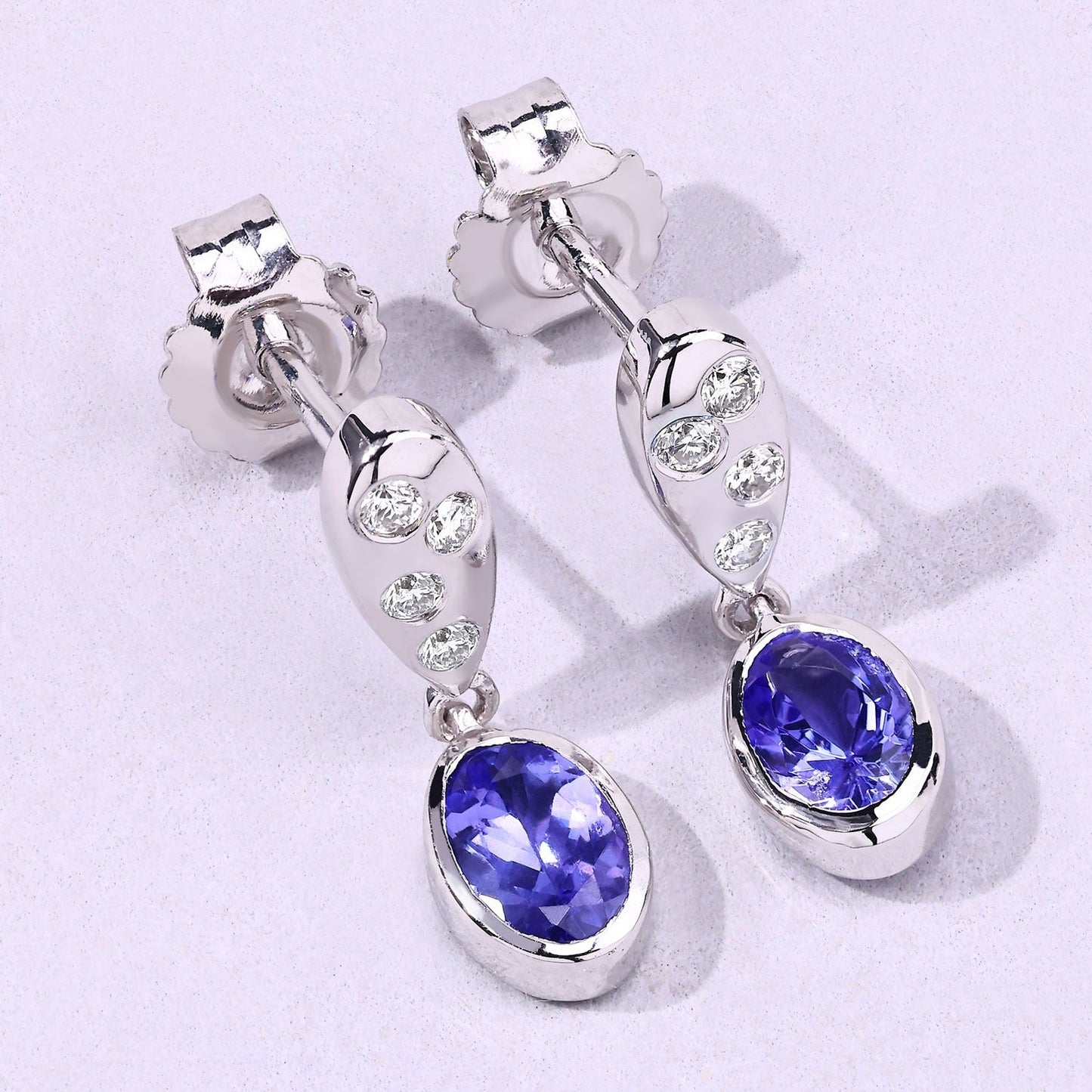 0.88 Ct Oval Violet Tanzanite & Lab Diamond Bezel Silver Dangle Earrings