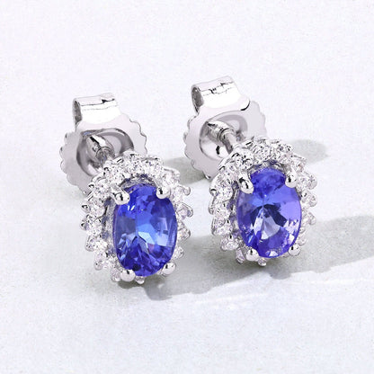 0.88 Ct Oval Violet Tanzanite & Lab Diamond Prong Silver Halo Basket Stud Earrings