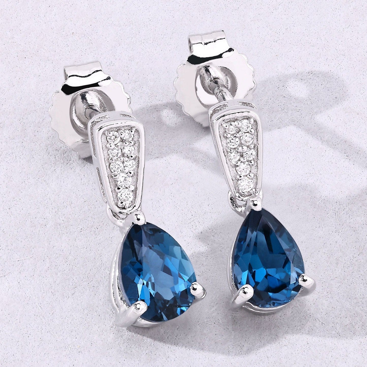 1.70 Ct Pear Deep Blue London Blue Topaz & Diamond Prong Silver Teardrop Dangle Earrings
