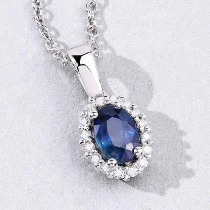 0.55 Ct oval Blue Sapphire and Lab Diamond prong Silver Halo pendant Necklace
