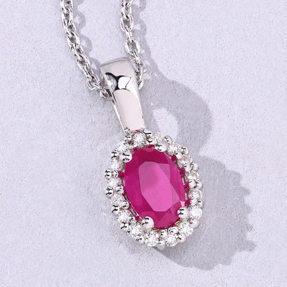 0.52 Ct oval pink Mozambique Ruby and Lab Diamond prong Silver Halo pendant Necklace