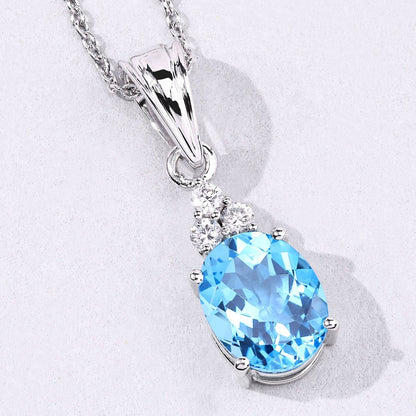 2.55 Ct oval Swiss Blue Topaz and Lab Diamond prong Silver Cocktail pendant Necklace