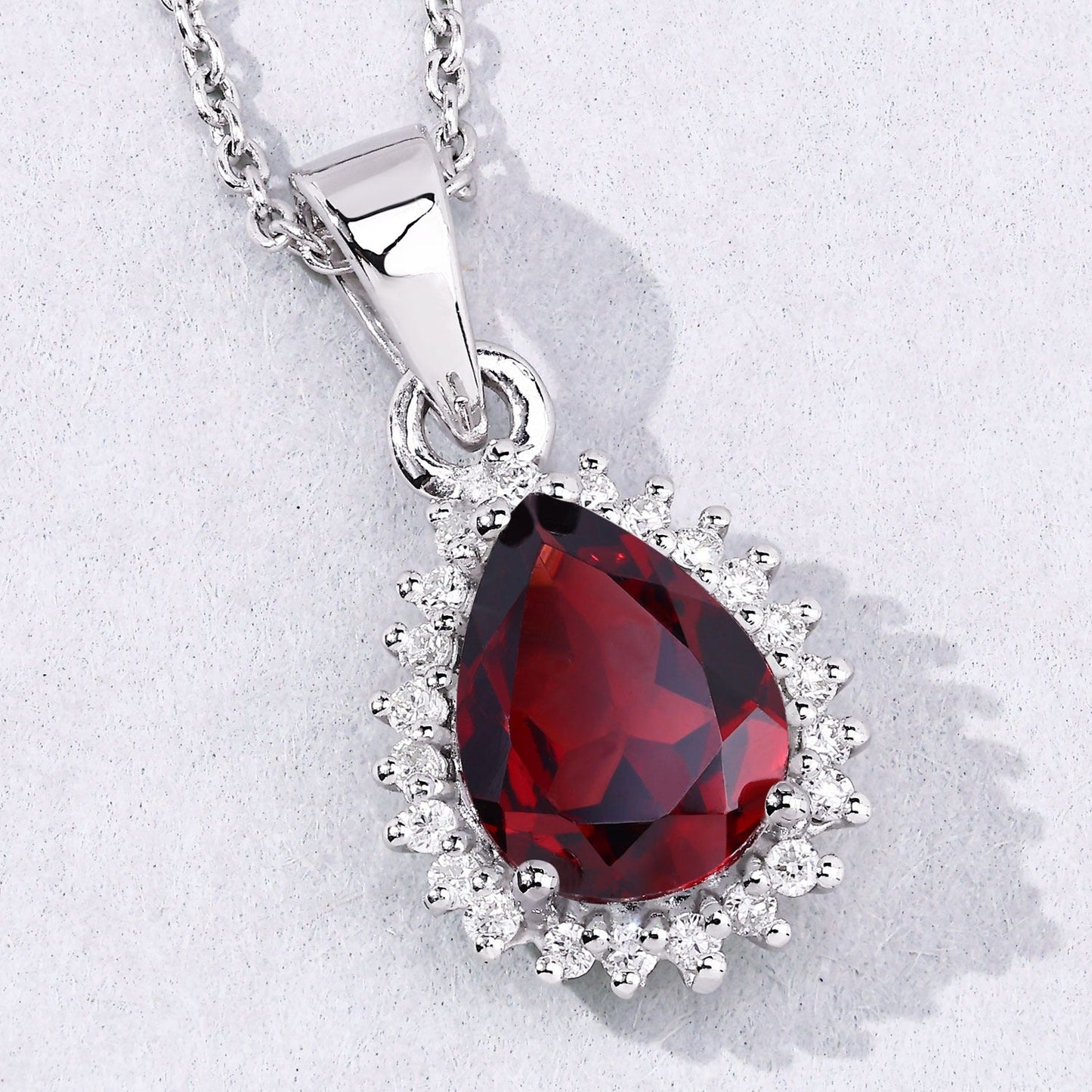 1.80 Ct pear red Mozambique Garnet and Lab Diamond prong Silver Halo teardrop pendant Necklace