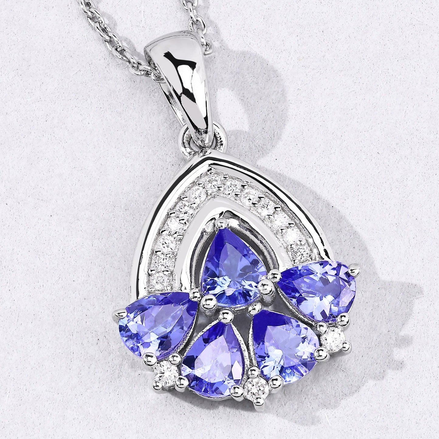1.40 Ct Pear Violet Tanzanite & Lab Diamond Prong Silver Five Stone Pendant Necklace