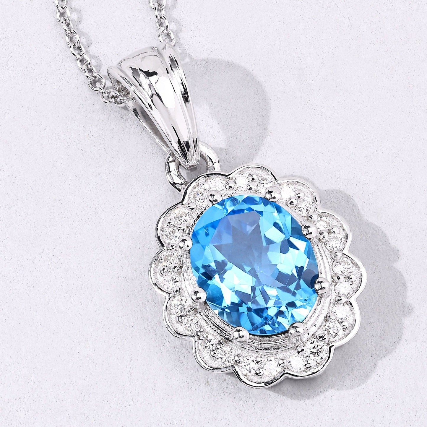 2.55 Ct Oval Swiss Blue Topaz & Lab Diamond Prong Silver Halo Floral Pendant Necklace