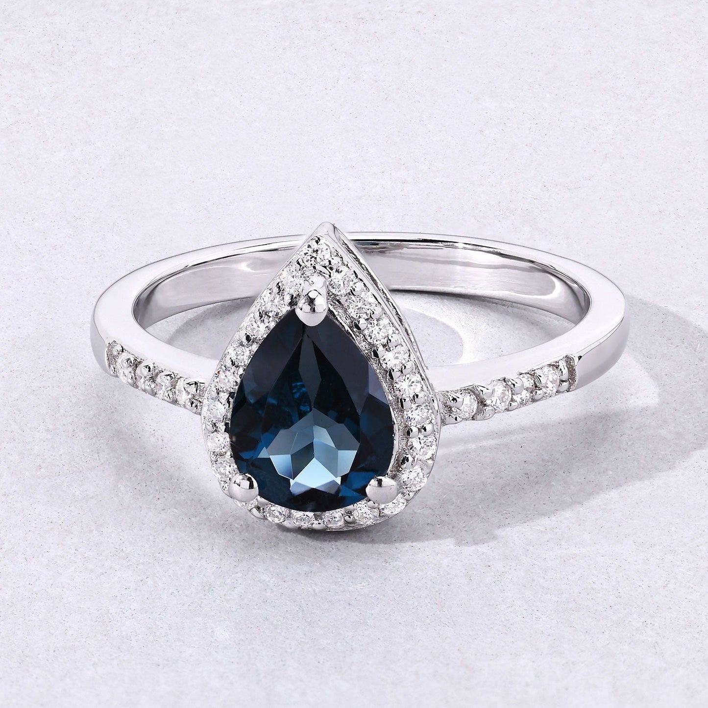 1.15 Ct Pear London Blue Topaz Lab Diamond Prong Silver Halo Pave Bridge Ring