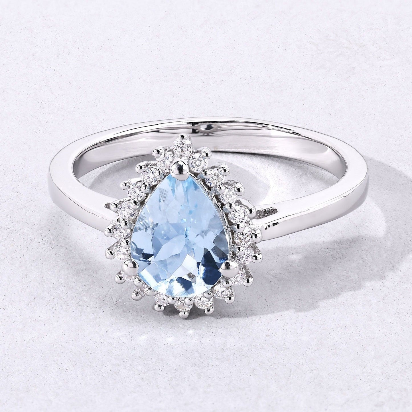 0.83 Ct Pear Blue Aquamarine & Lab Diamond Prong Silver Halo Ring