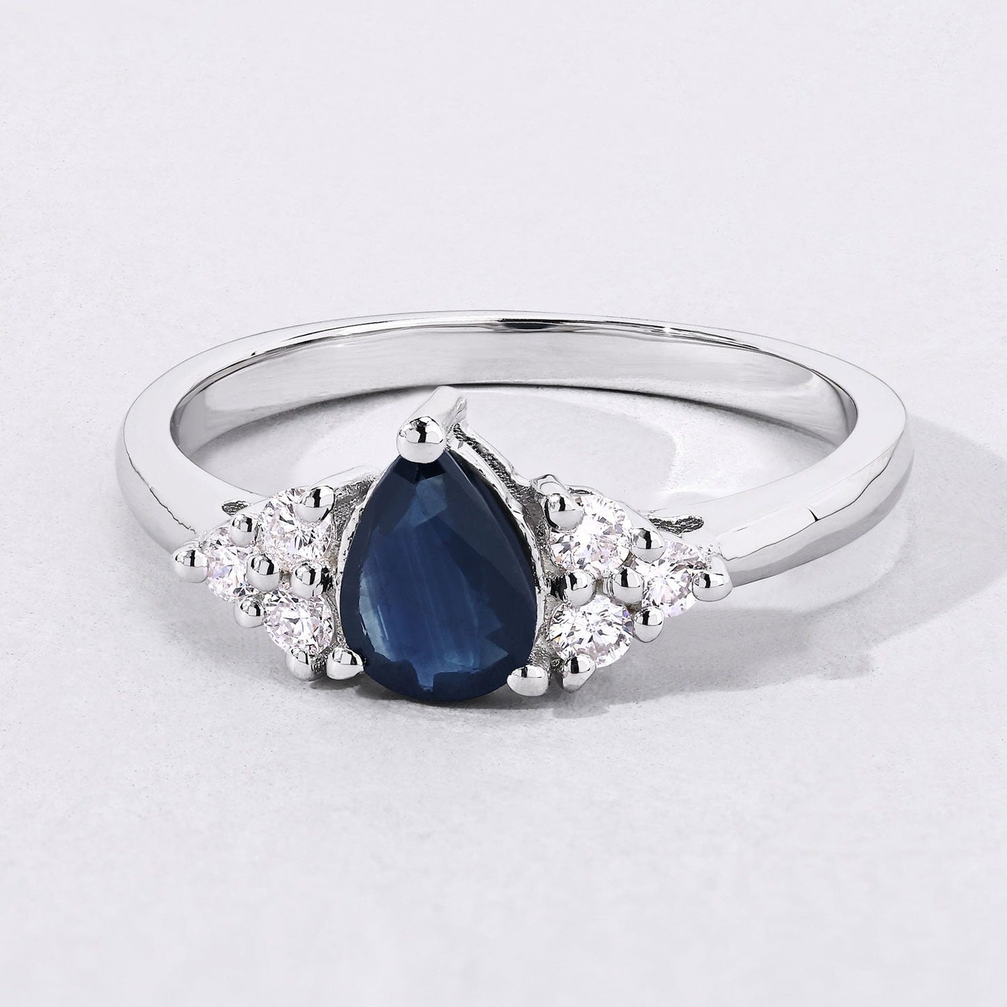 0.80 Ct Pear Blue Sapphire and Lab Diamond Prong Silver Cocktail Ring