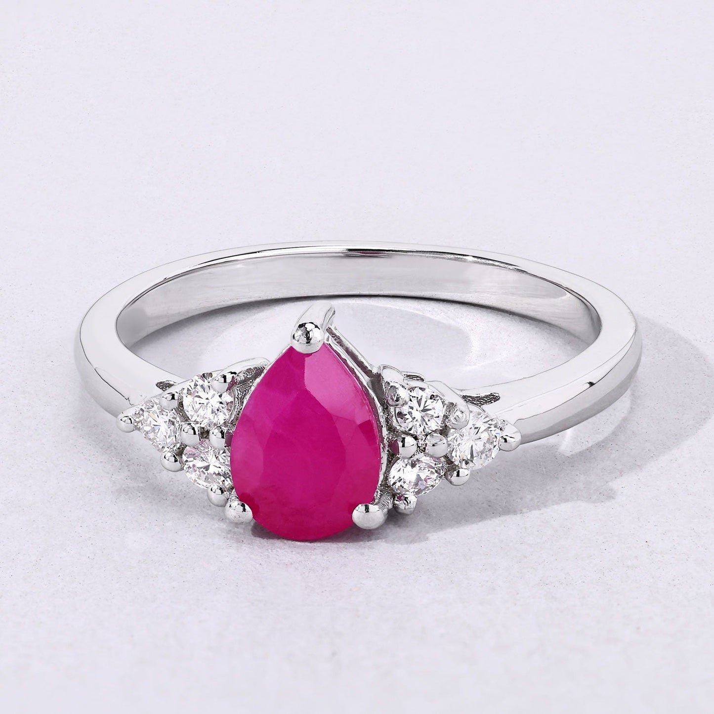 0.80 Ct Pear Pink Mozambique Ruby and Lab Diamond Prong Silver Cocktail Ring