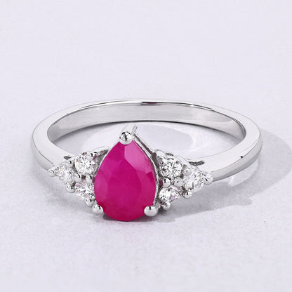 0.80 Ct Pear Pink Mozambique Ruby and Lab Diamond Prong Silver Cocktail Ring