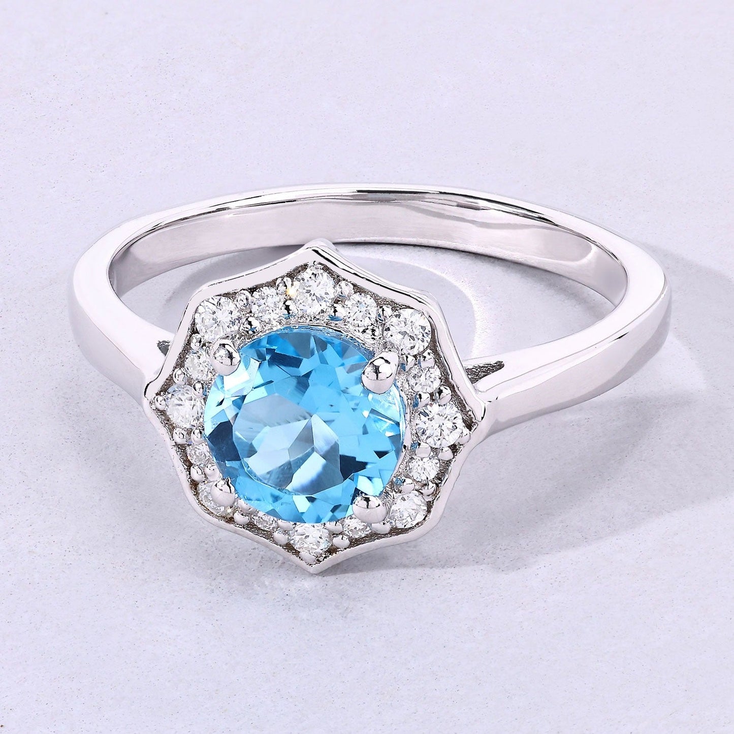 1.20 Ct Round Swiss Blue Topaz and Lab Diamond Prong Silver Halo Ring