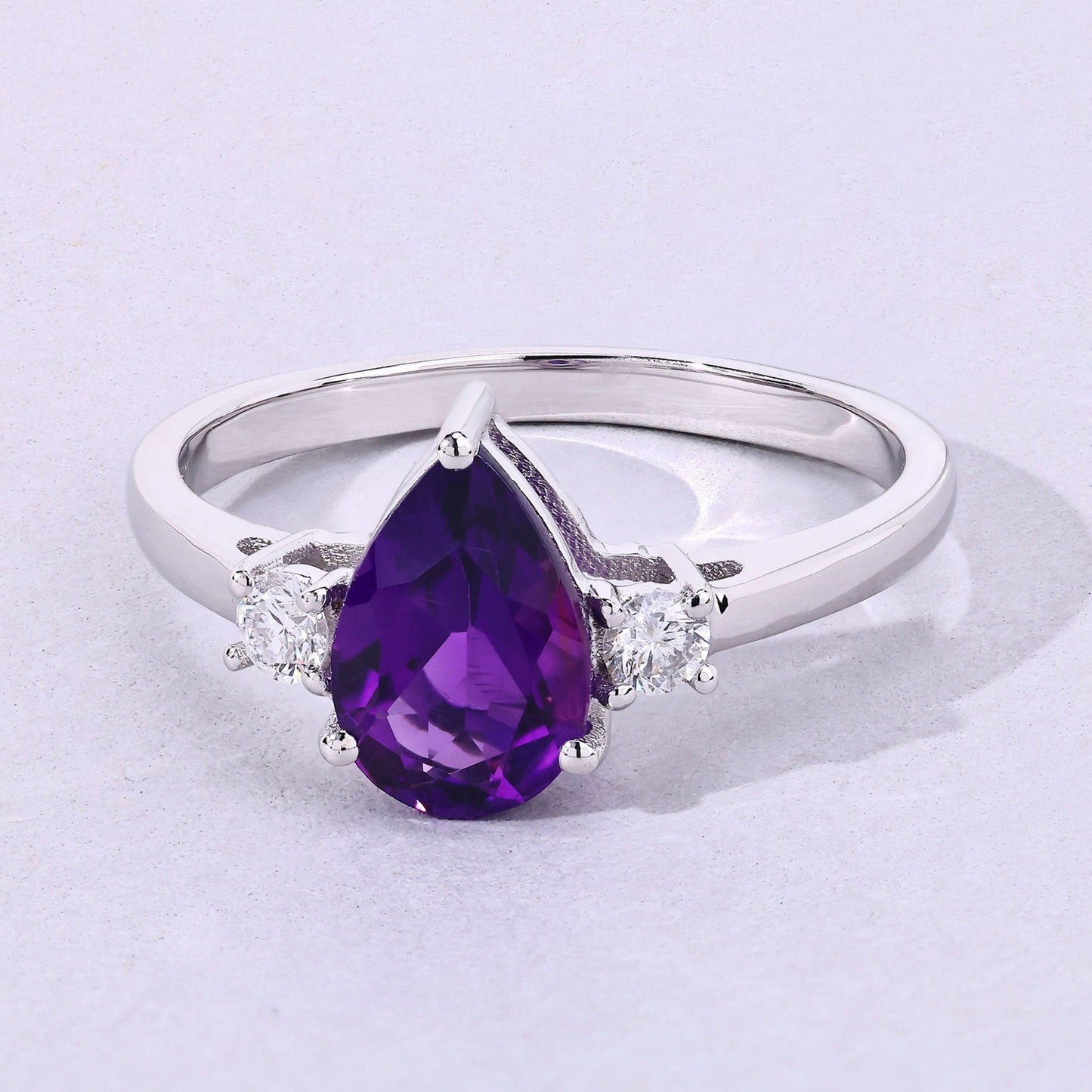 1.15 Ct Pear Purple Amethyst and Lab Diamond Prong Silver Three Stone Ring