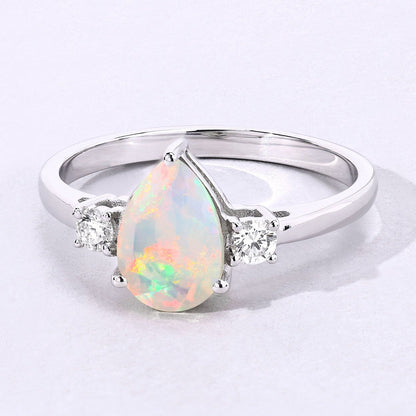 0.90 Ct Pear White Ethiopian Opal and Lab Diamond Prong Silver Three Stone Ring