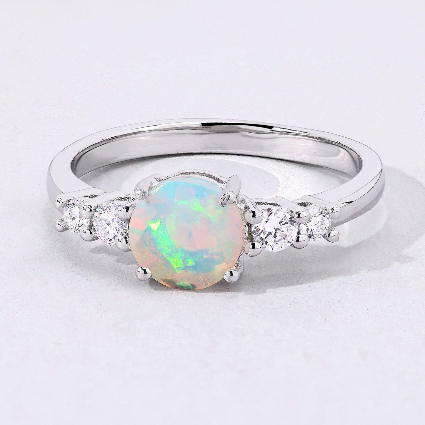 0.60 Ct Round White Ethiopian Opal and Lab Diamond Silver Prong Five Stone Ring