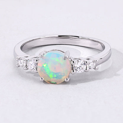 0.60 Ct Round White Ethiopian Opal and Lab Diamond Silver Prong Five Stone Ring