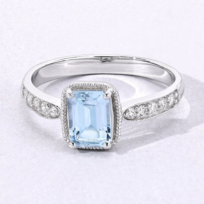 0.80 Ct Octagon Blue Aquamarine and Lab Diamond Prong Silver Pave Bridge Ring