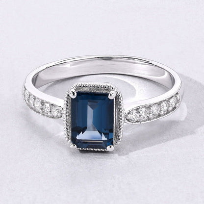 1.07 Ct Octagon London Blue Topaz and Lab Diamond Prong Silver Pave Bridge Ring