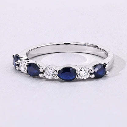 0.80 Ct Pear Blue Sapphire and Lab Diamond Prong Silver Seven Stone Half Eternity Ring