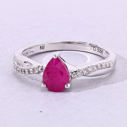 0.80 Ct Pear Pink Ruby & Lab Diamond Prong Silver Pave Crossover Ring