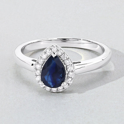 0.80 Ct Pear Blue Sapphire & Lab Diamond Prong Silver Halo Ring