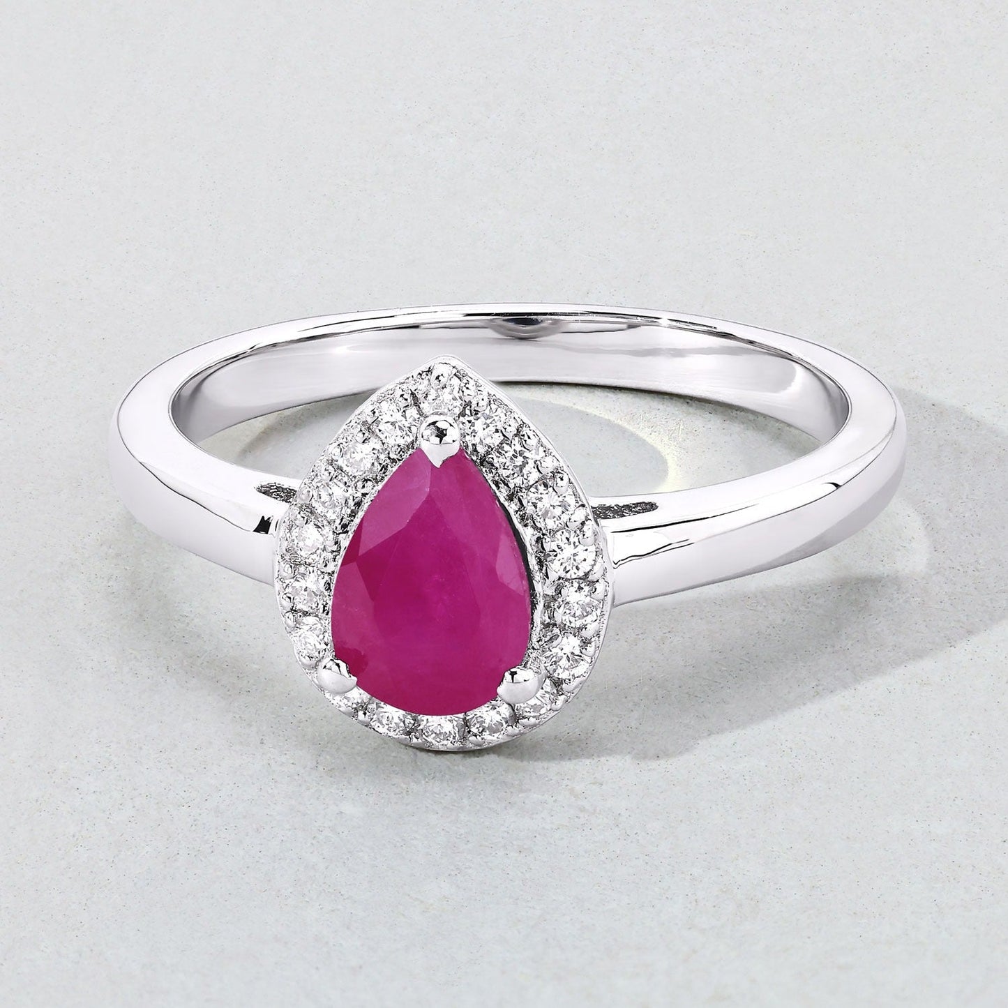 0.80 Ct Pear Pink Ruby & Lab Diamond Prong Sterling Silver Halo Ring