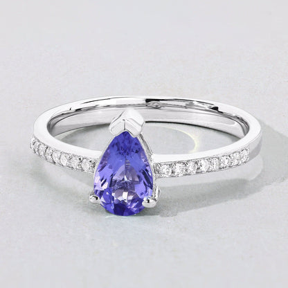 0.78 Ct Pear Violet Tanzanite and Lab Diamond V-Prong Silver Pave Bridge Ring
