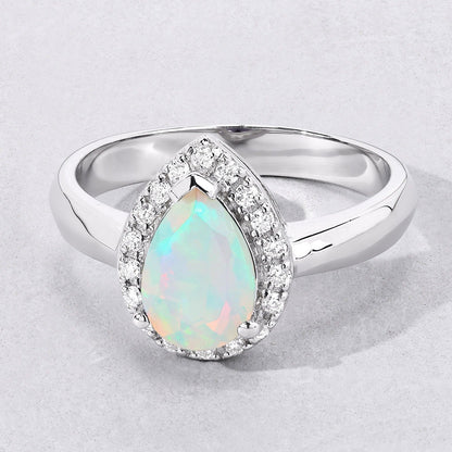 0.90 Ct Teardrop White Ethiopian Opal and Lab Diamond Prong Silver Halo Ring