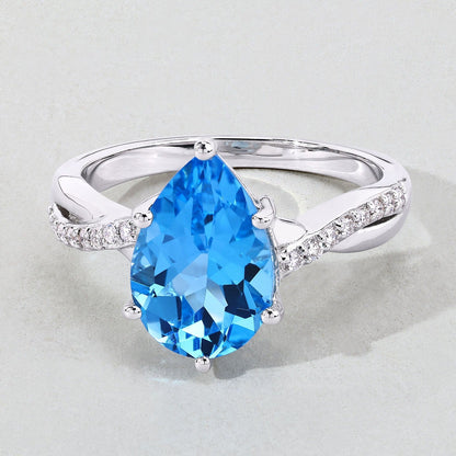 3.50 Ct Pear Swiss Blue Topaz & Lab Diamond Prong Silver Pave Bypass Ring