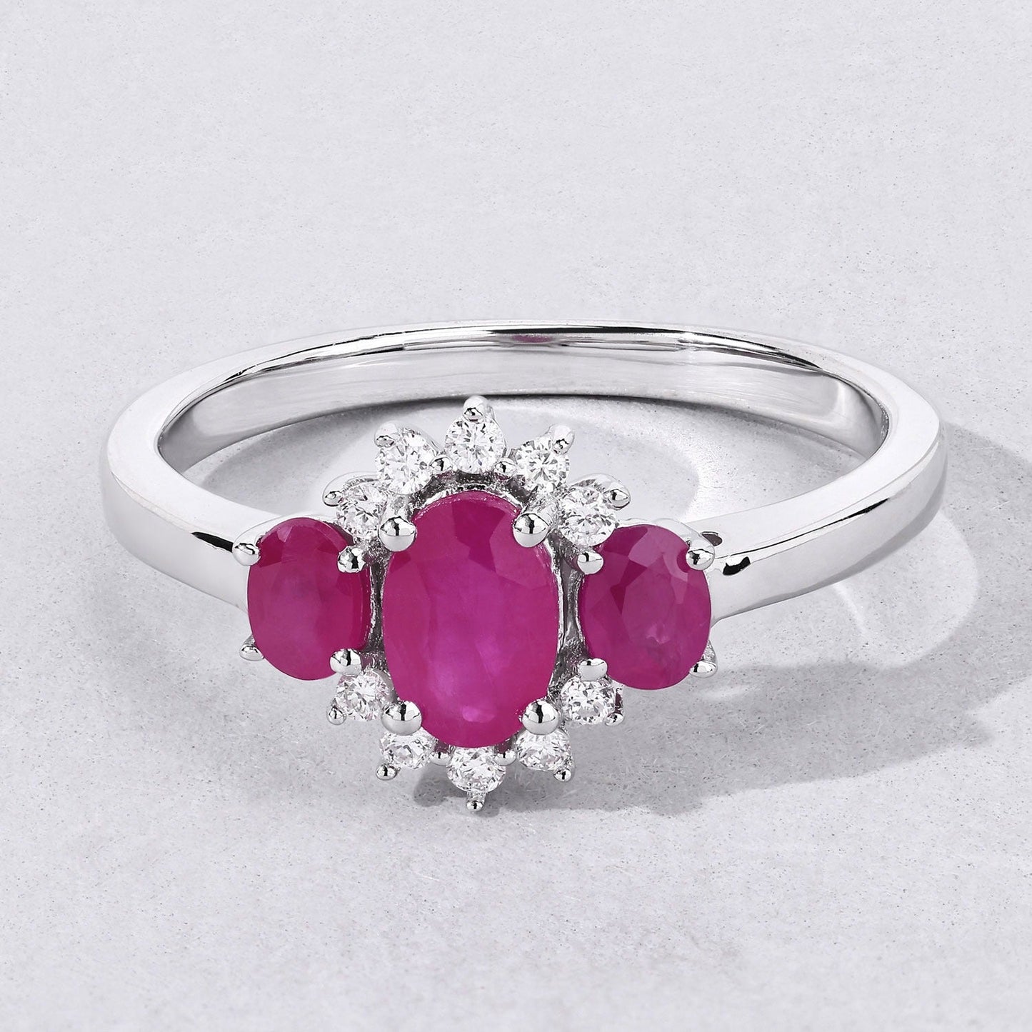 0.92 Ct Oval Pink Mozambique Ruby and Lab Diamond Prong Silver Three Stone Cocktail Ring