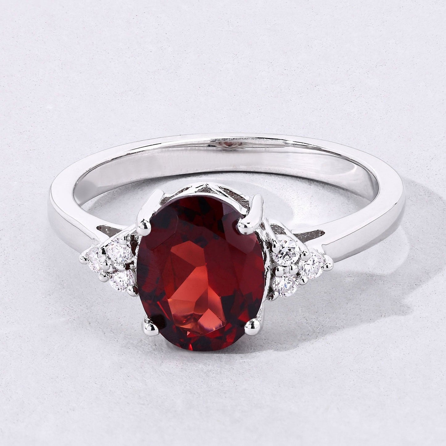 2 Ct Oval Red Mozambique Garnet and Lab Diamond Prong Silver Cocktail Ring