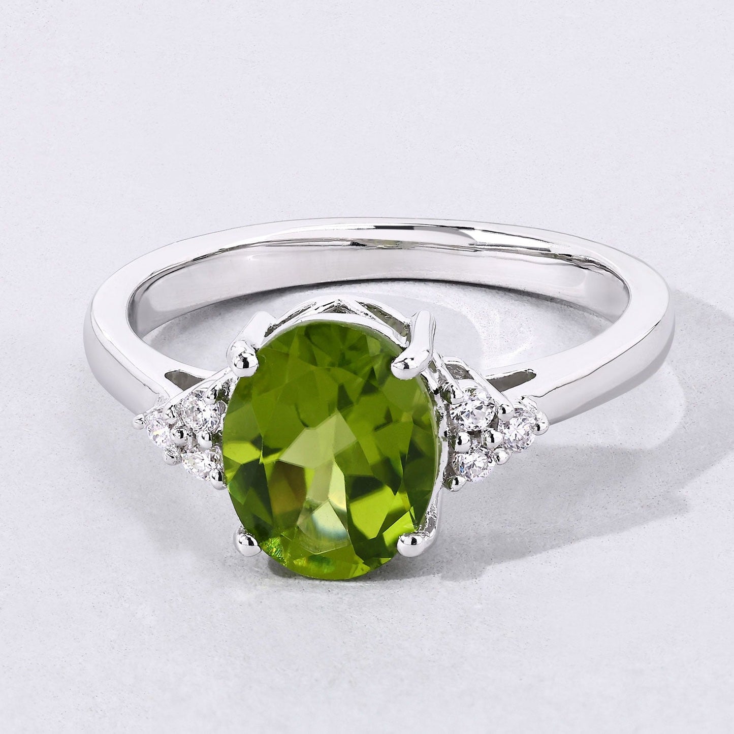 1.70 Ct Oval Green Peridot and Lab Diamond Prong Silver Cocktail Ring