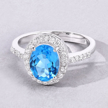 2 Ct Oval Swiss Blue Topaz and Lab Diamond Prong Silver Halo Pave Ring