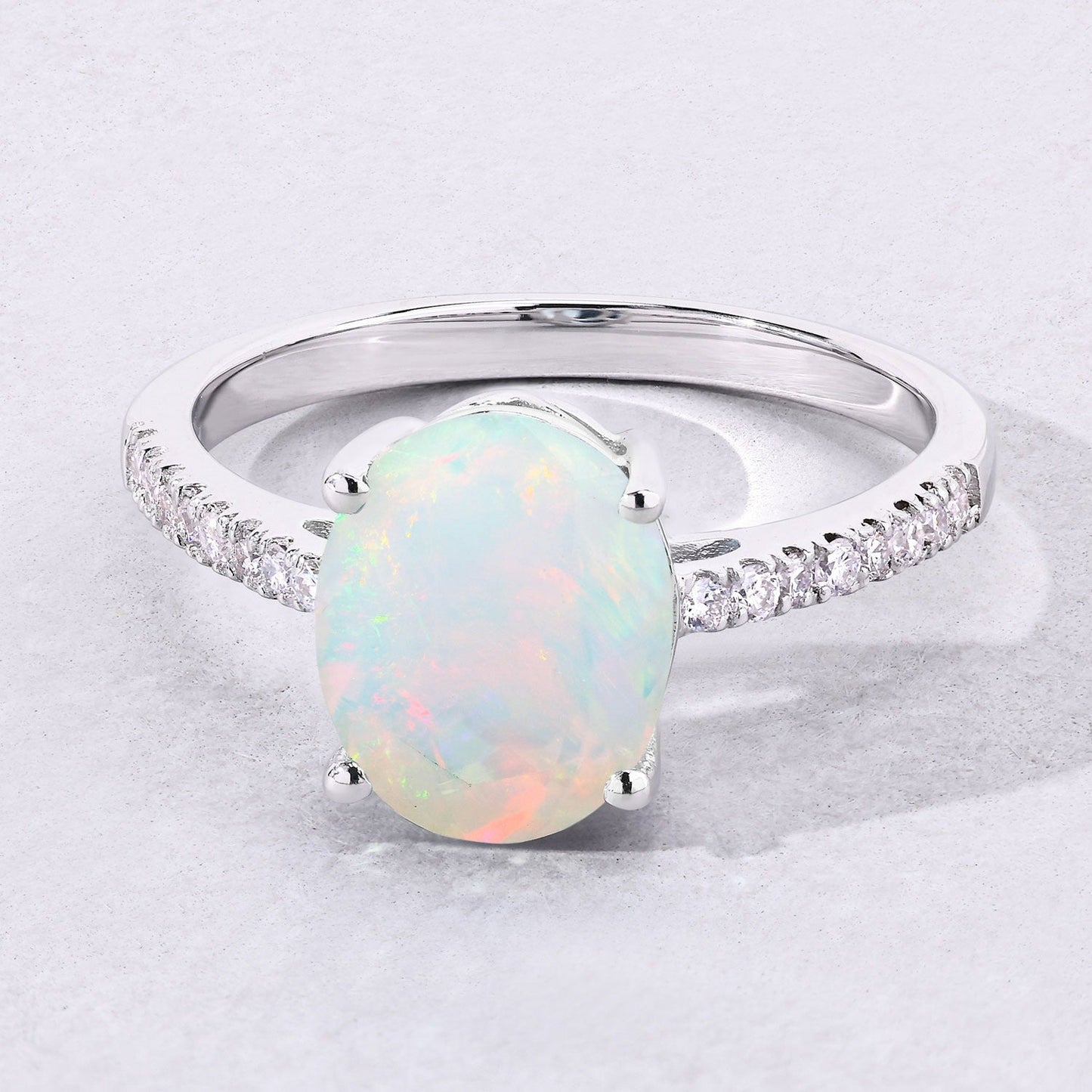 1.56 Ct Oval White Ethiopian Opal and Lab Diamond Silver Pave Bridge Ring