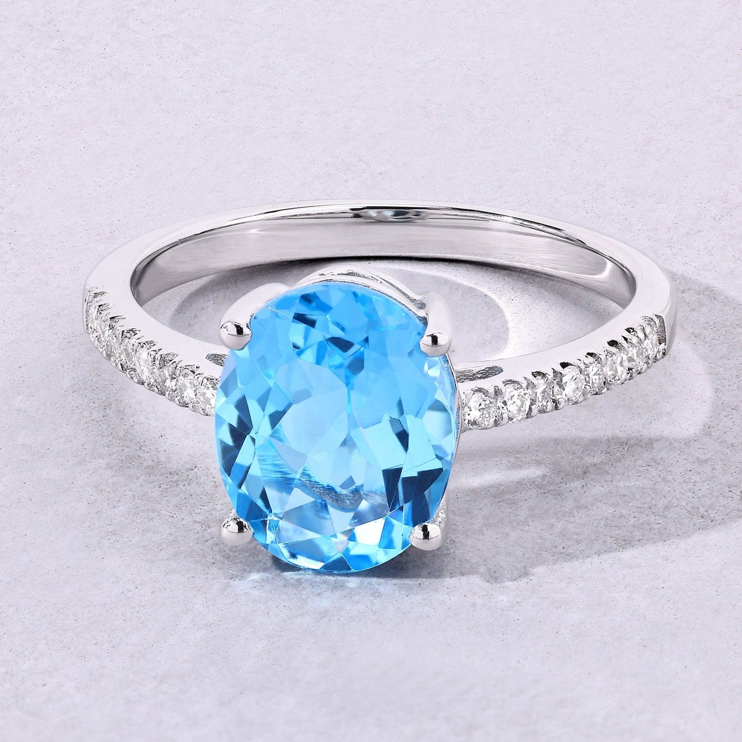 2.55 Ct Oval Swiss Blue Topaz & Lab Diamond Silver Pave Bridge Ring
