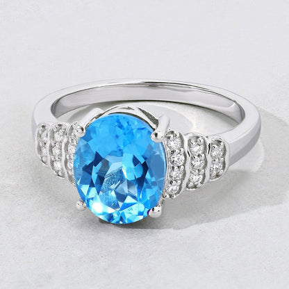 2.55 Ct Oval Swiss Blue Topaz & Lab Diamond Prong Silver Bridge Ring