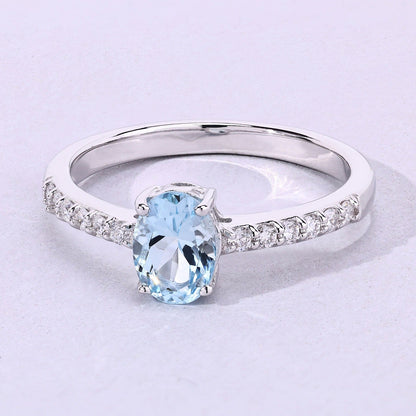 0.60 Ct Oval Blue Aquamarine and Lab Diamond Prong Silver Pave Band Ring